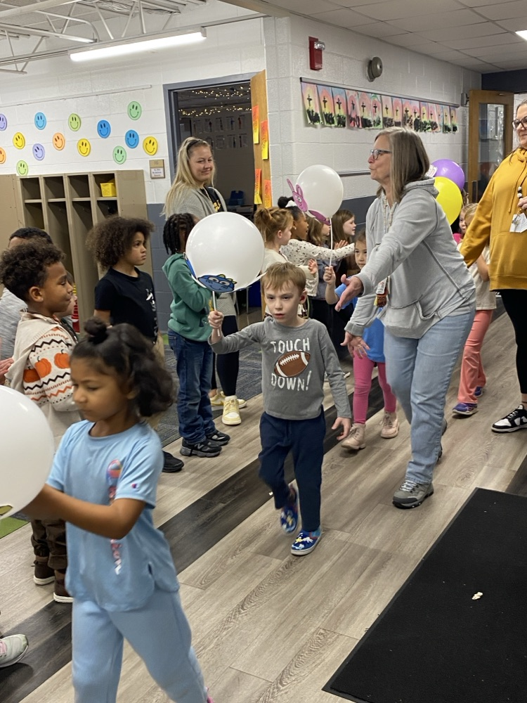 student with balloon