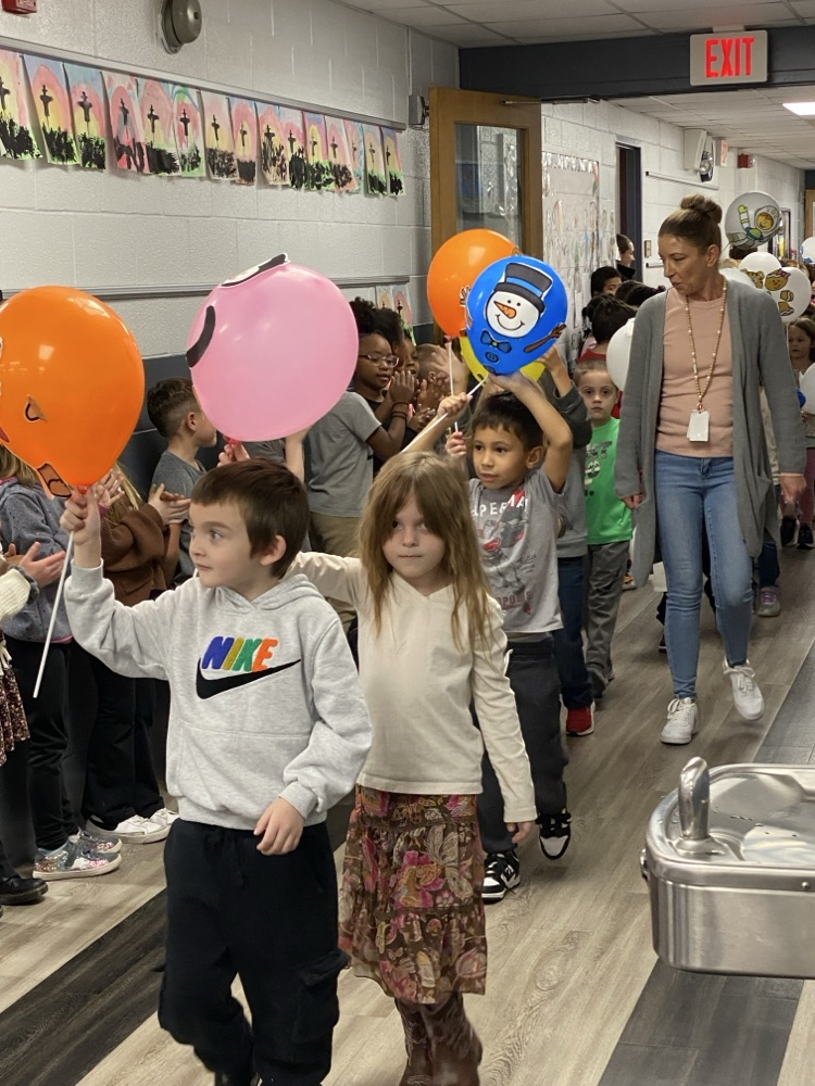 student with balloon