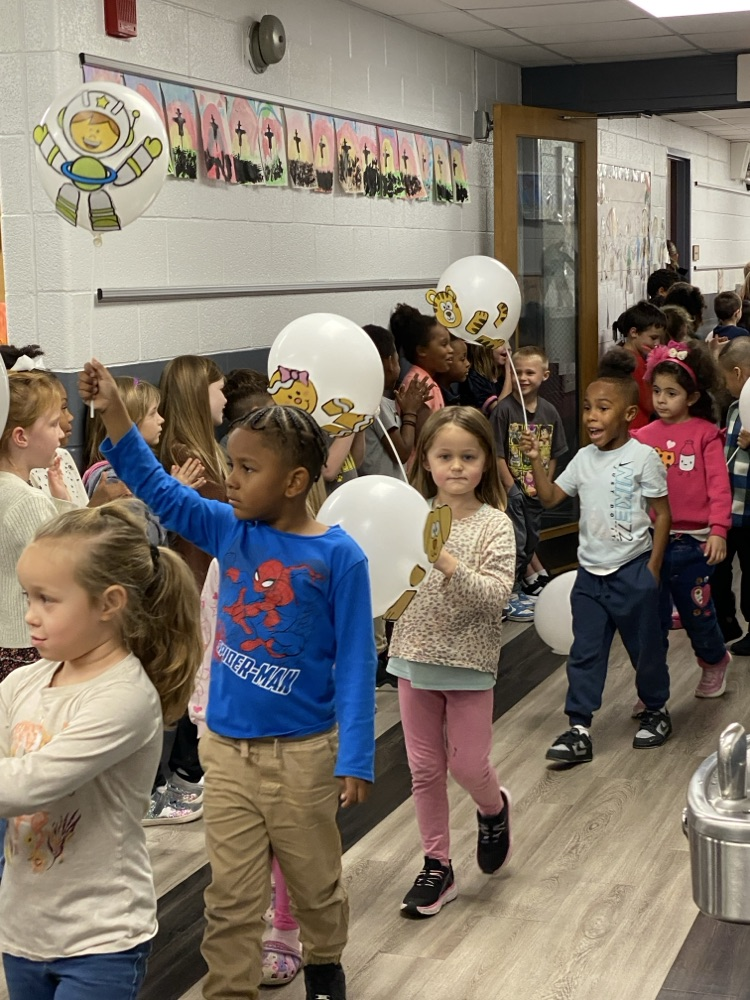 student with balloon