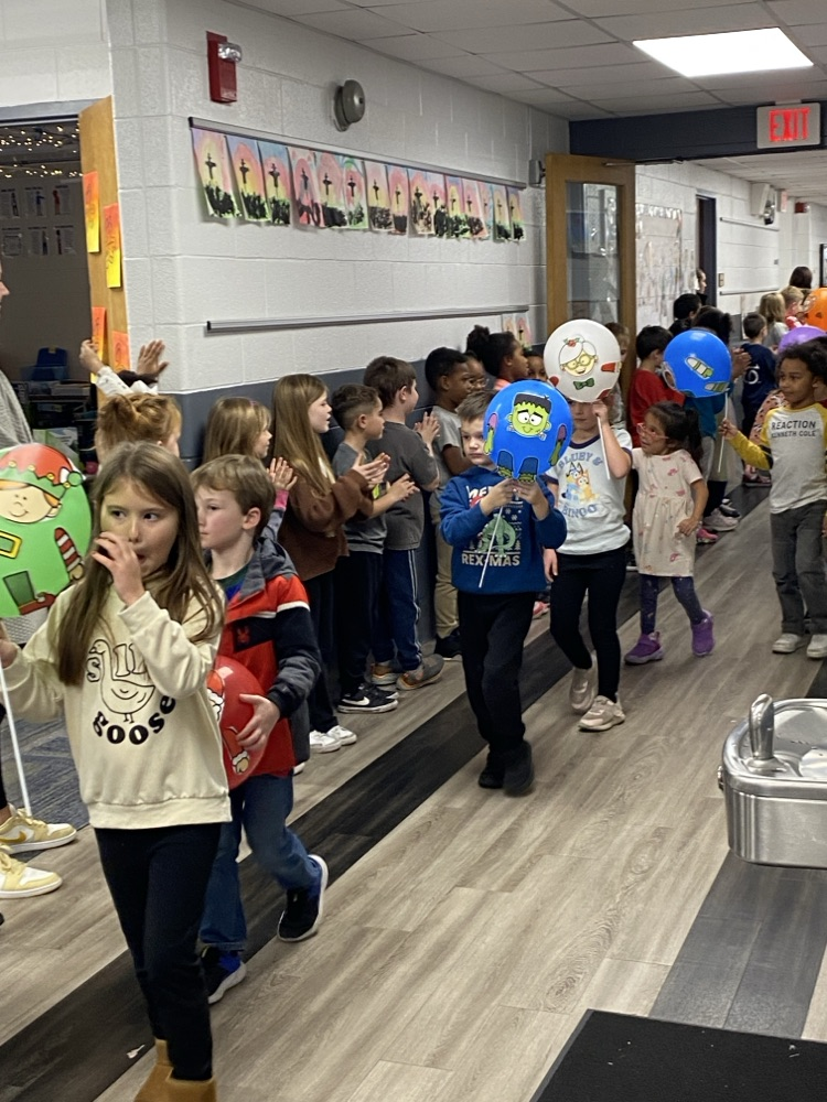 student with balloon