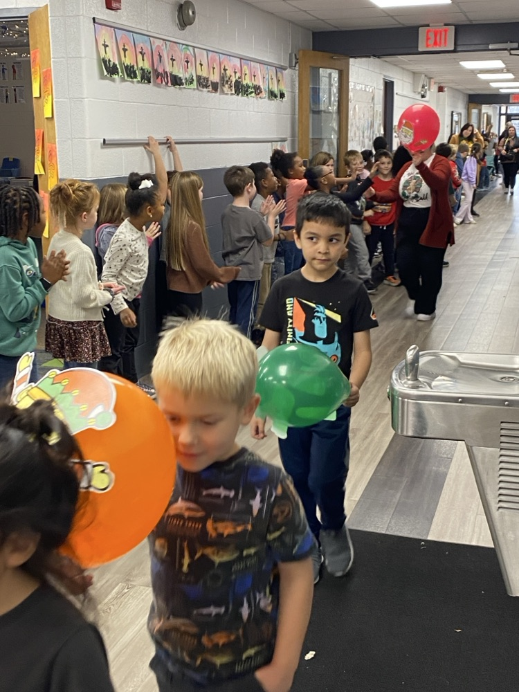 student with balloon