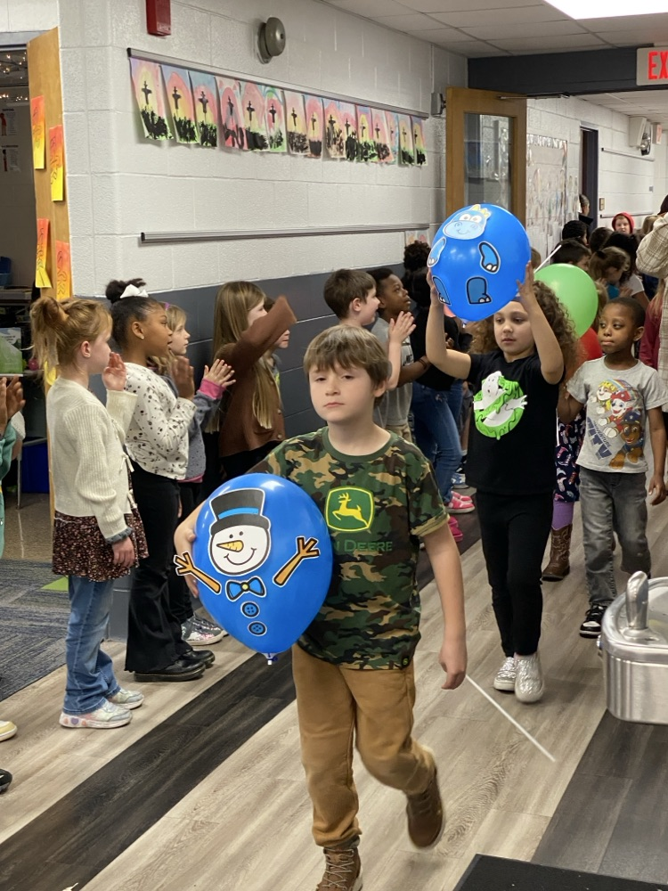 student with balloon