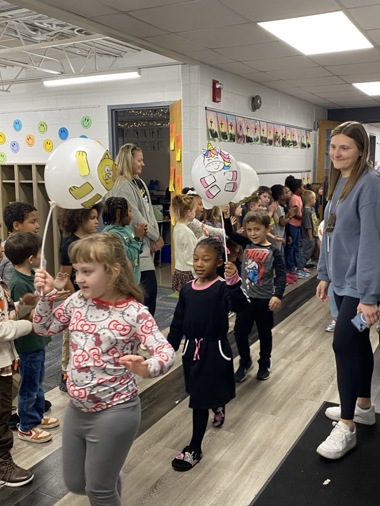 student with balloon
