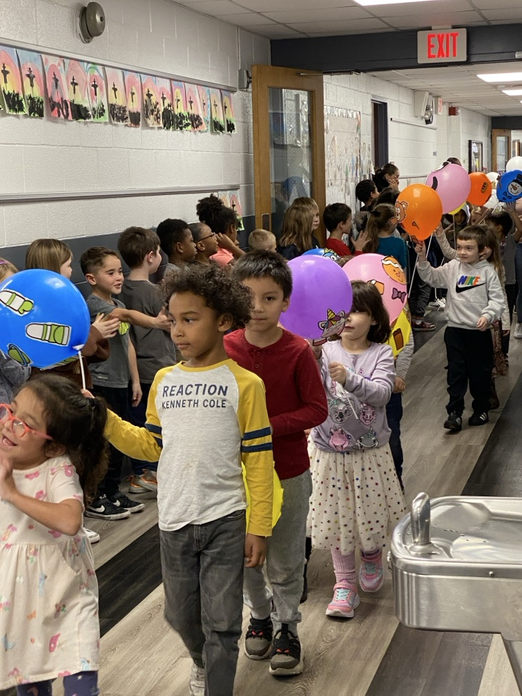 student with balloon