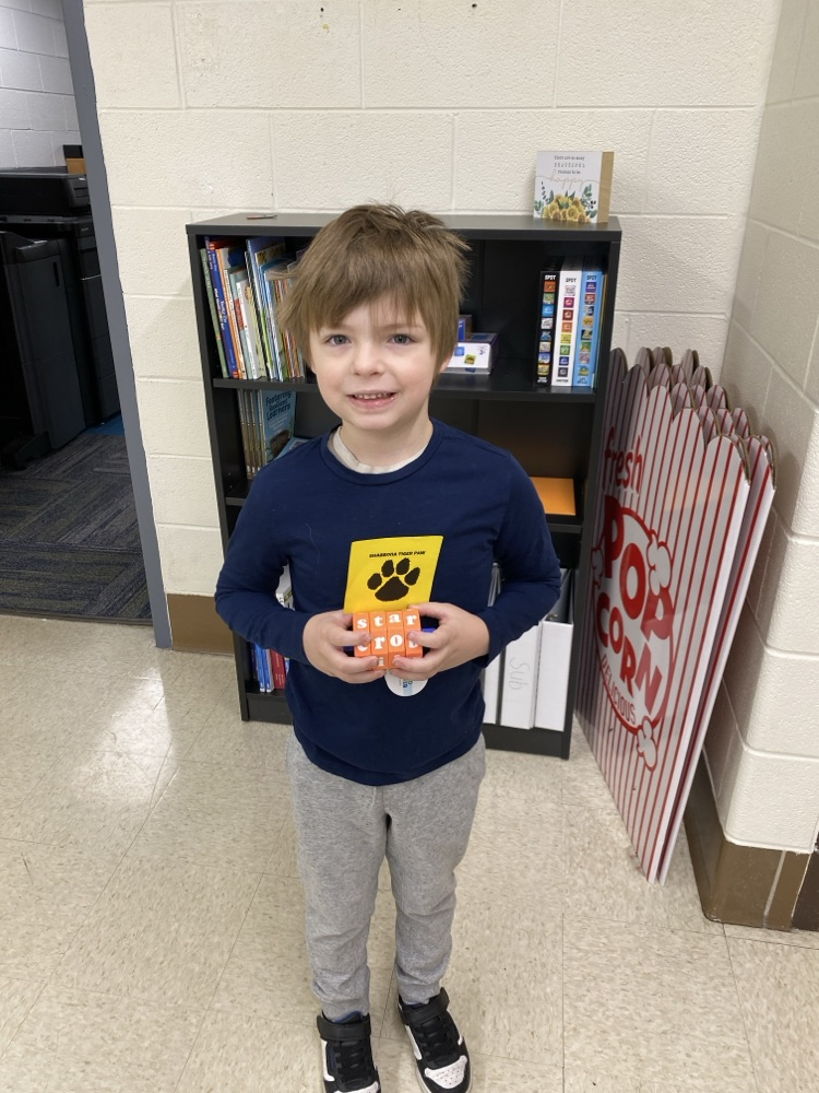 student with tiger paw prize
