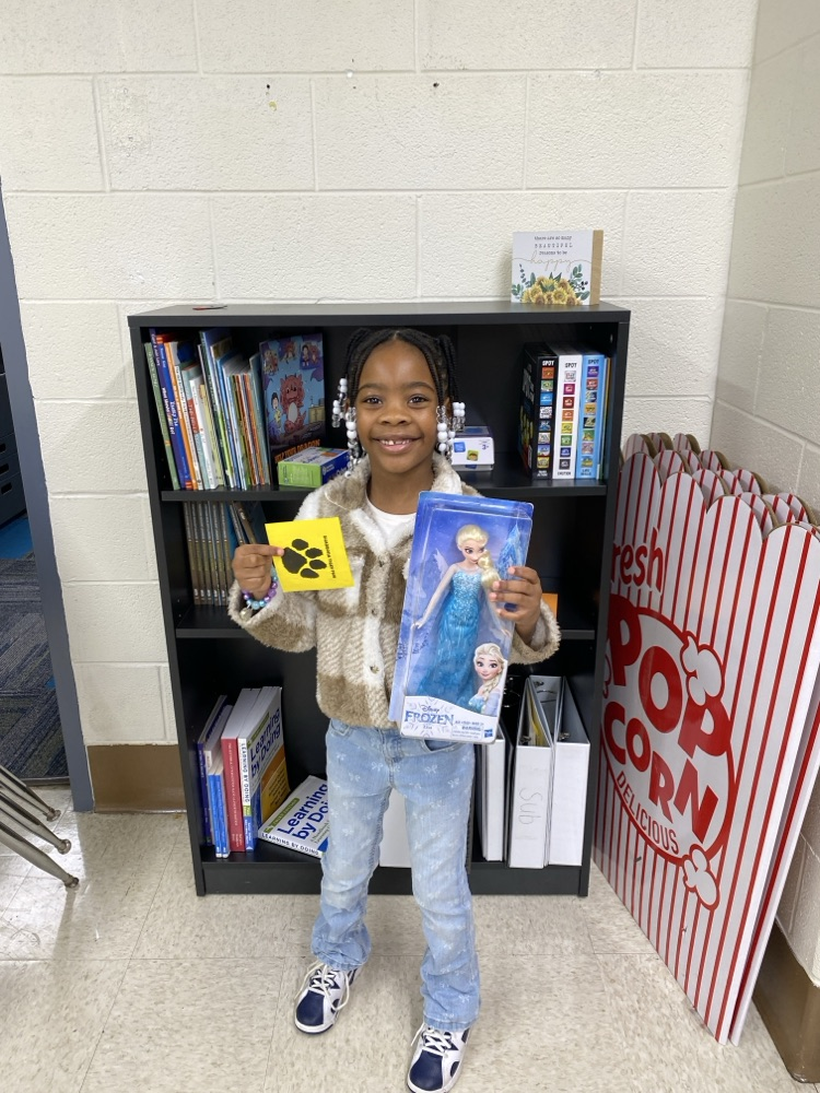 student with tiger paw prize