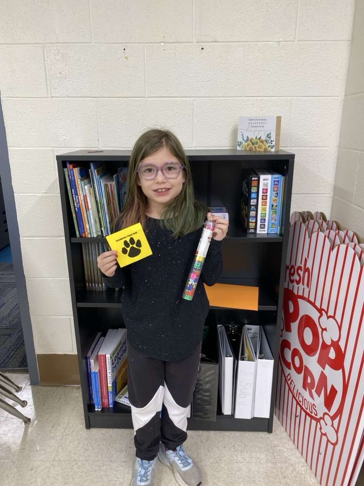 student with tiger paw prize