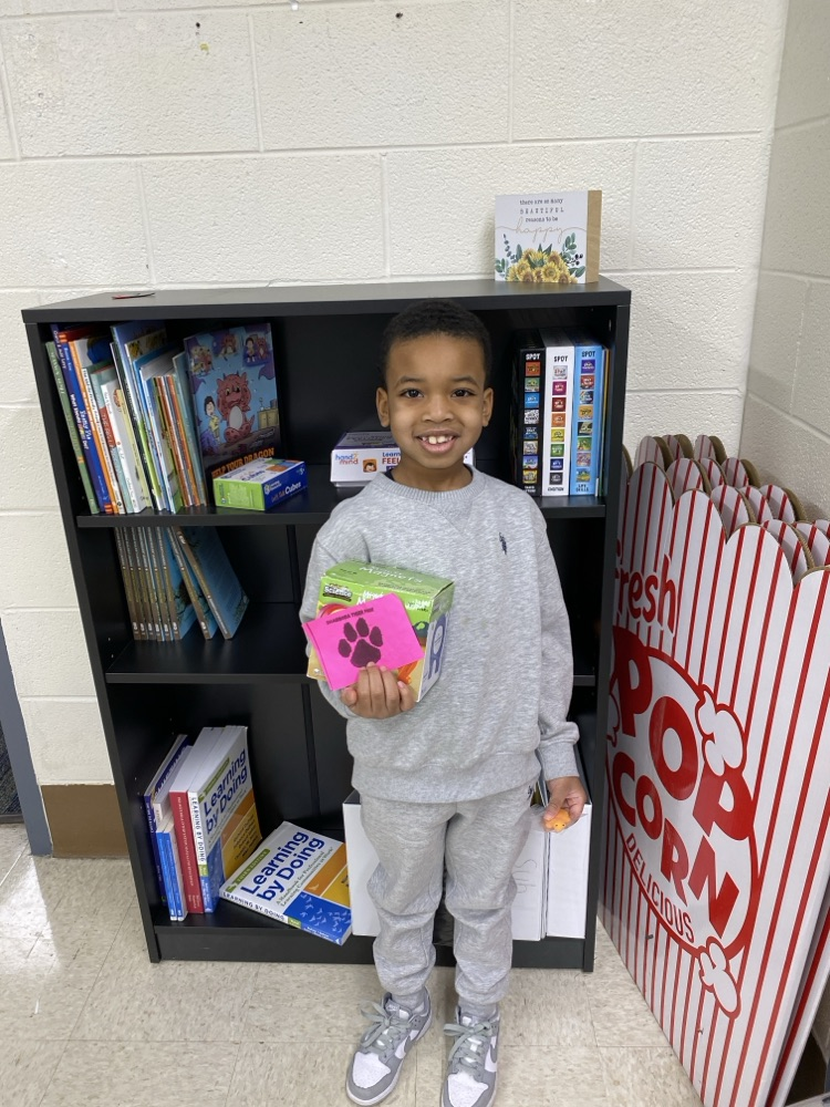 student with tiger paw prize