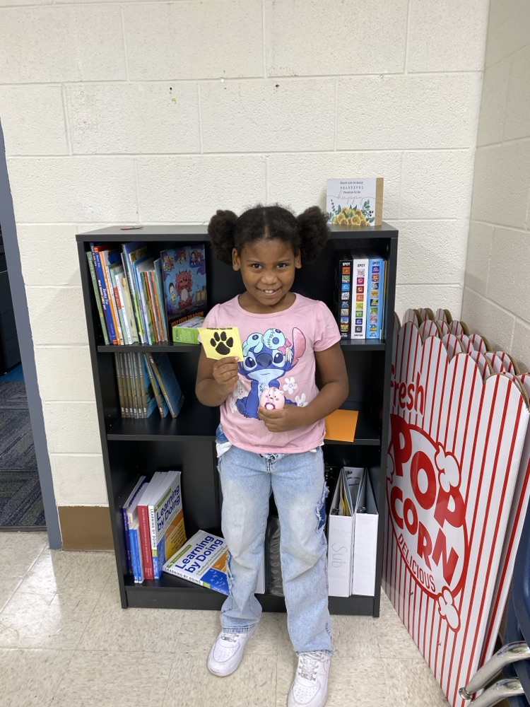 student with tiger paw prize