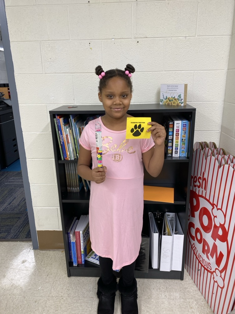student with tiger paw prize