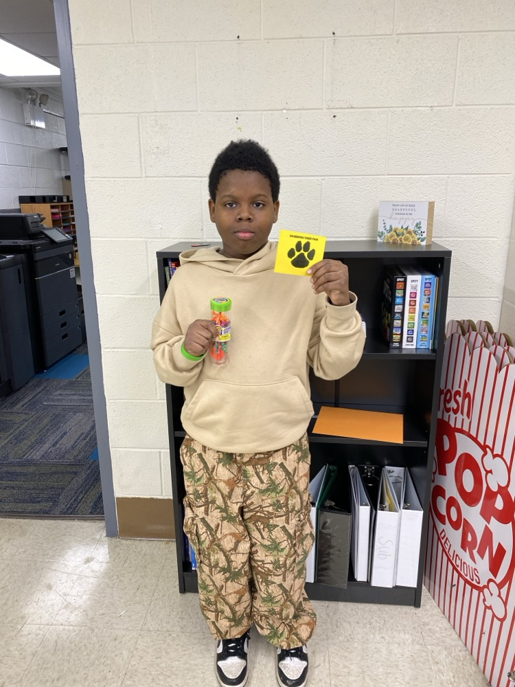 student with tiger paw prize