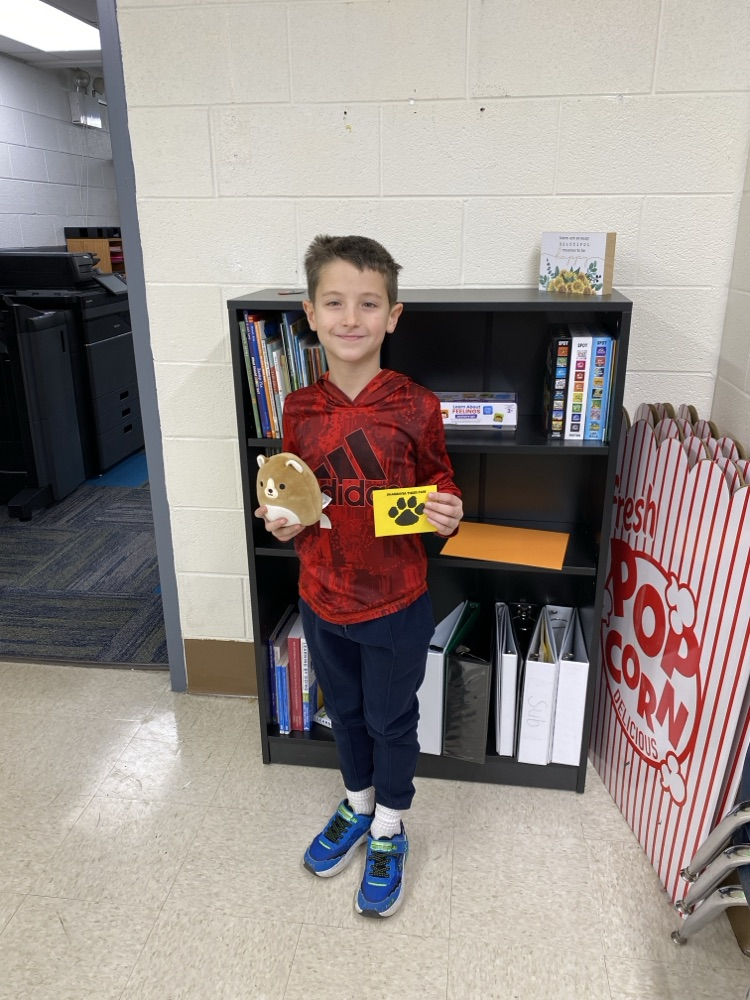 student with tiger paw prize