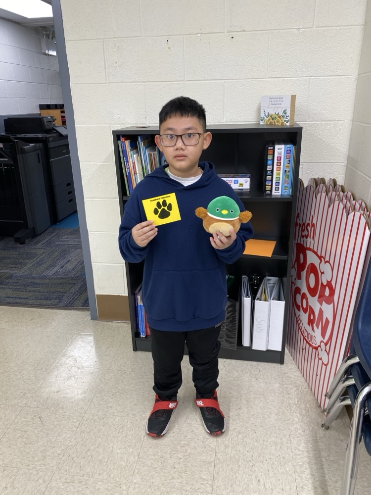student with tiger paw prize