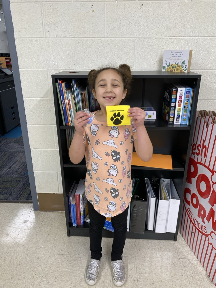 student with tiger paw prize