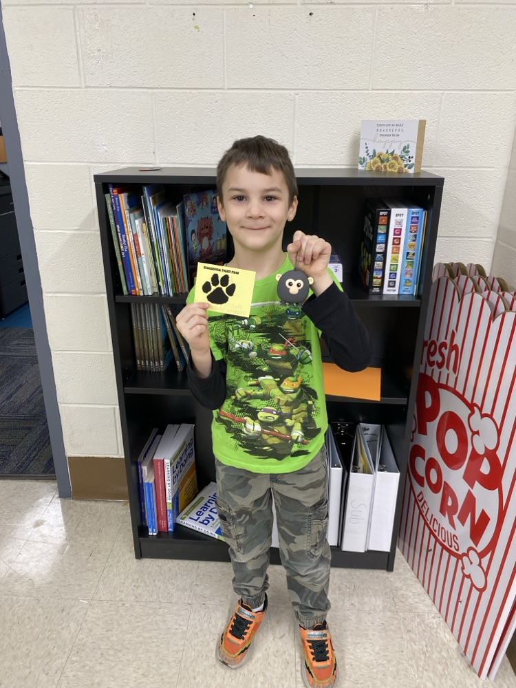 student with tiger paw prize
