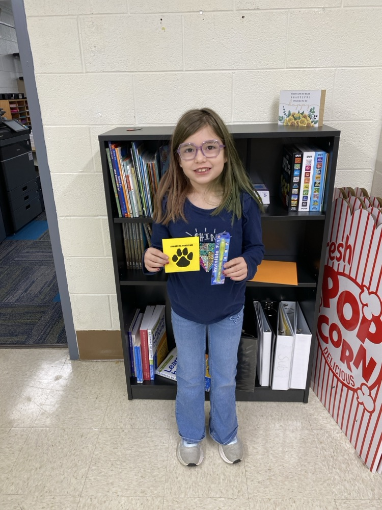 student with tiger paw prize