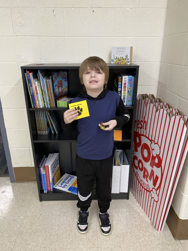 student with tiger paw prize