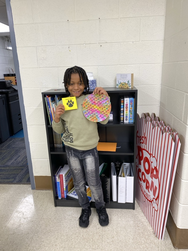 student with tiger paw prize