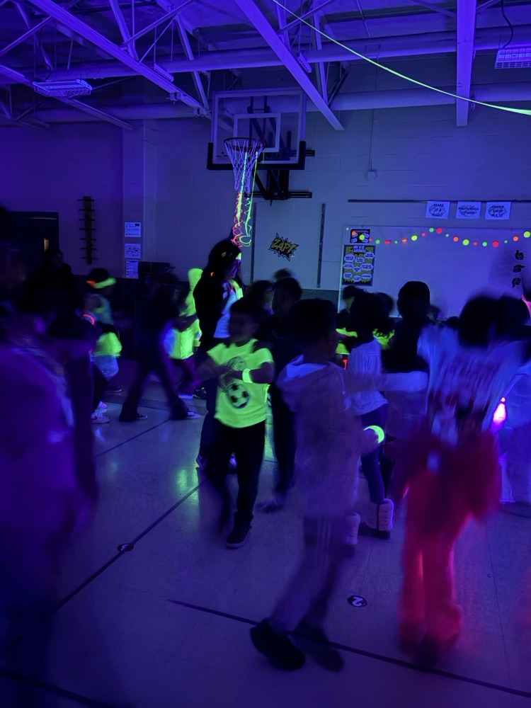 students dancing at the glow party