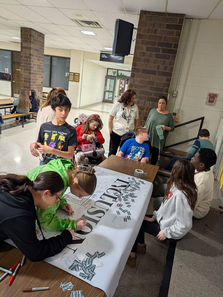 Students Signing Banner