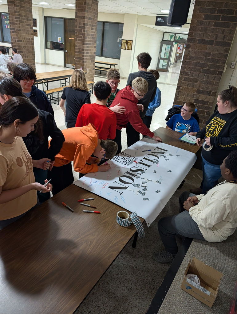 Students Signing Banner