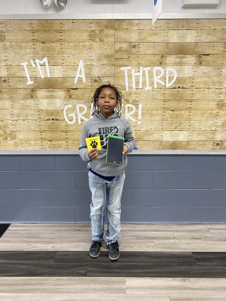 student with tiger paw reward