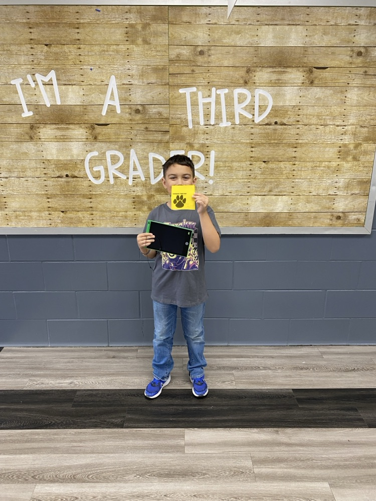 student with tiger paw reward