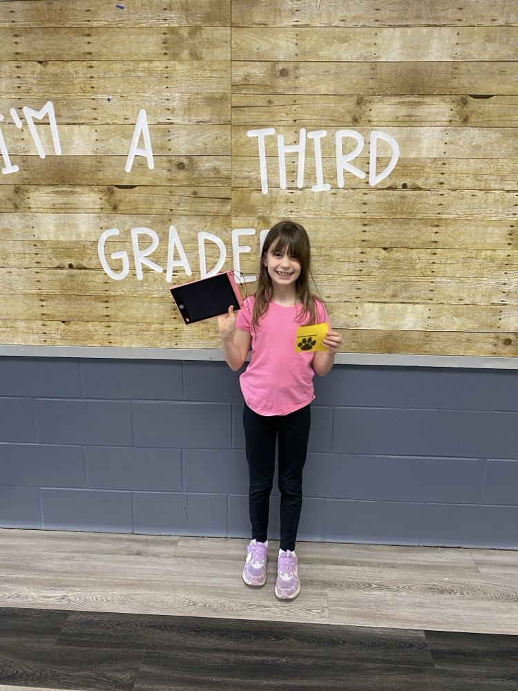 student with tiger paw reward