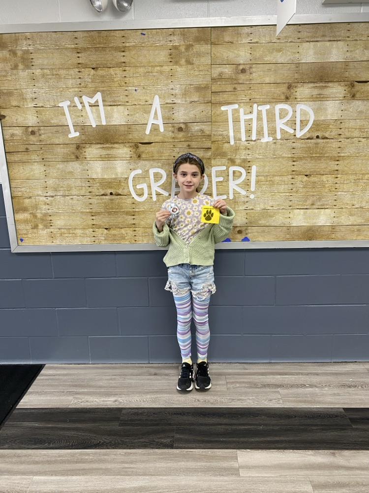 student with tiger paw reward