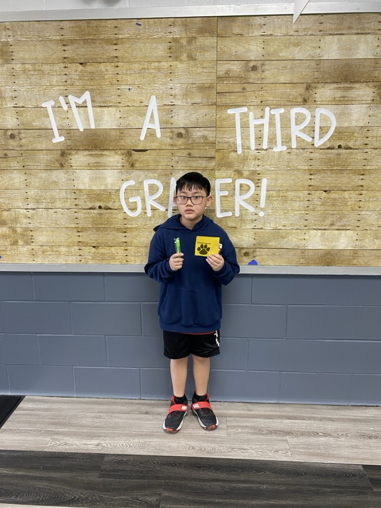 student with tiger paw reward