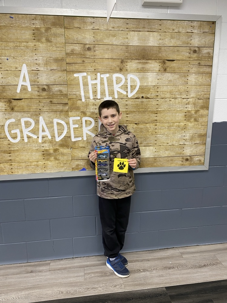 student with tiger paw reward