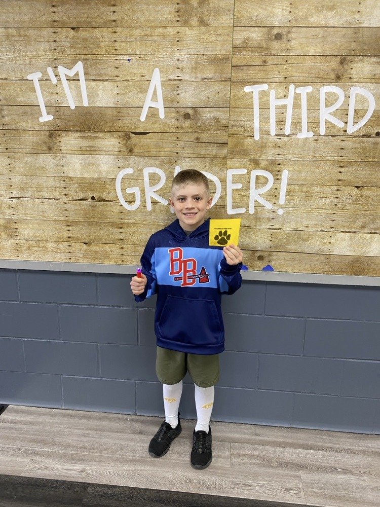 student with tiger paw reward