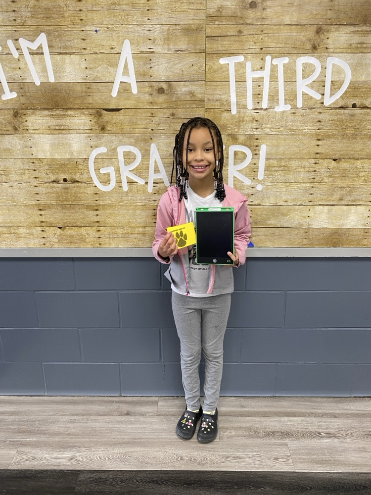 student with tiger paw reward