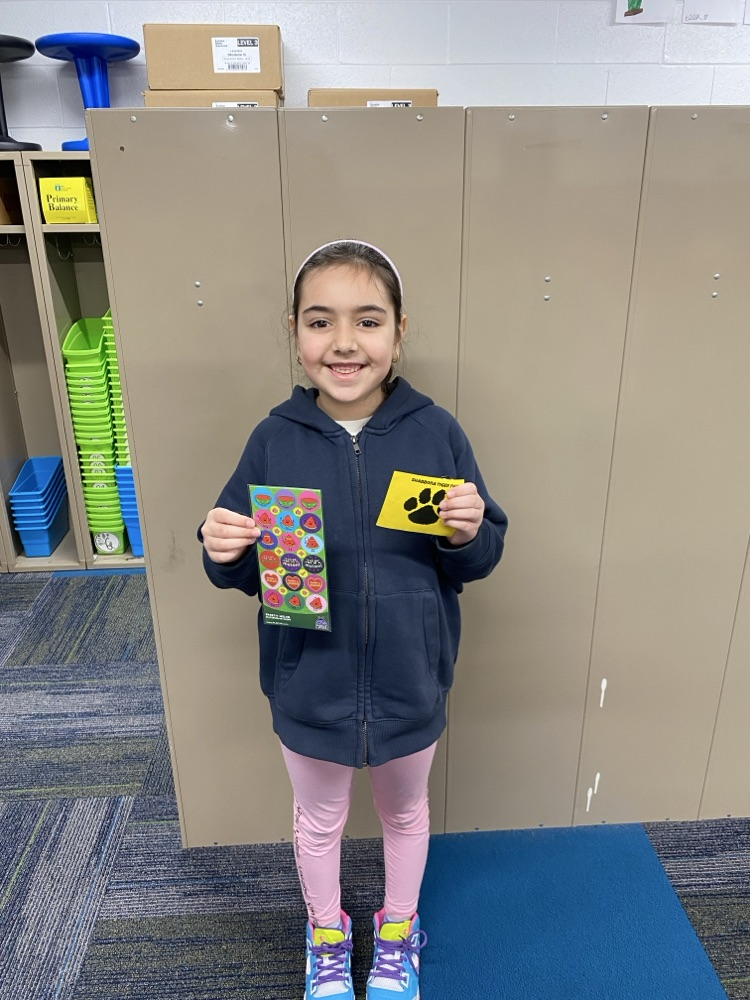 student with tiger paw reward