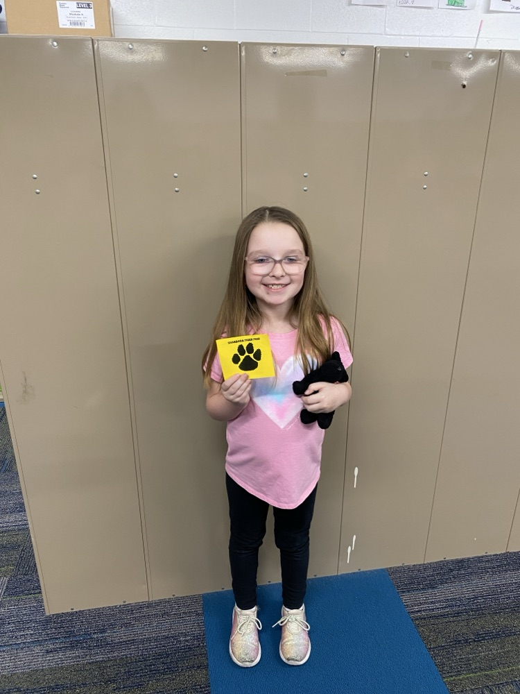 student with tiger paw reward