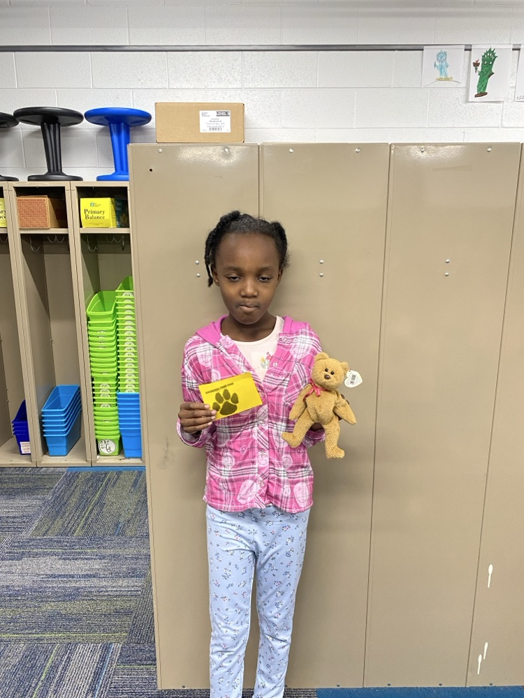 student with tiger paw reward