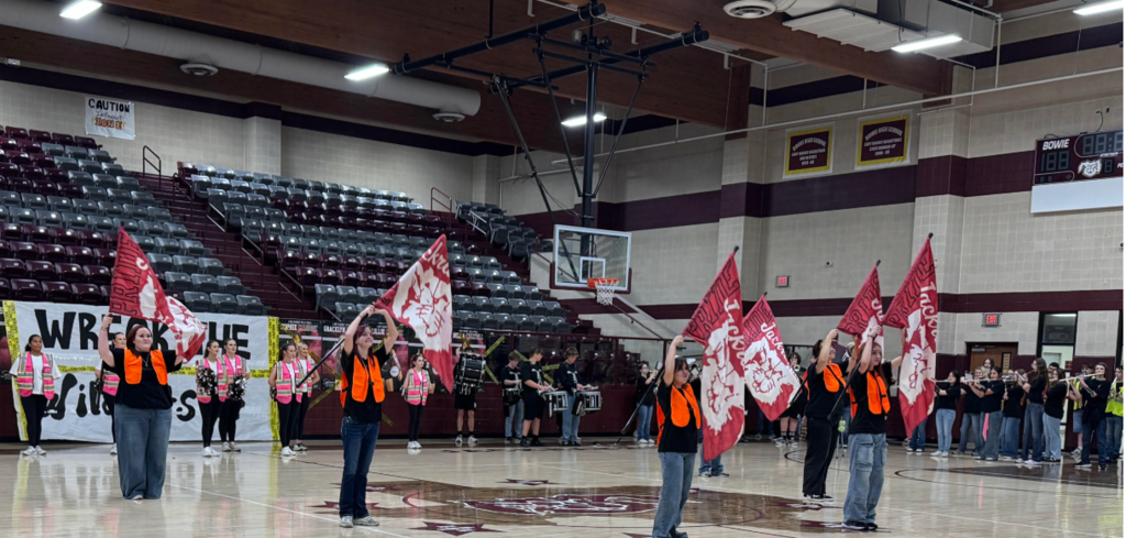 Might Marching Maroon Band with Flag Corp