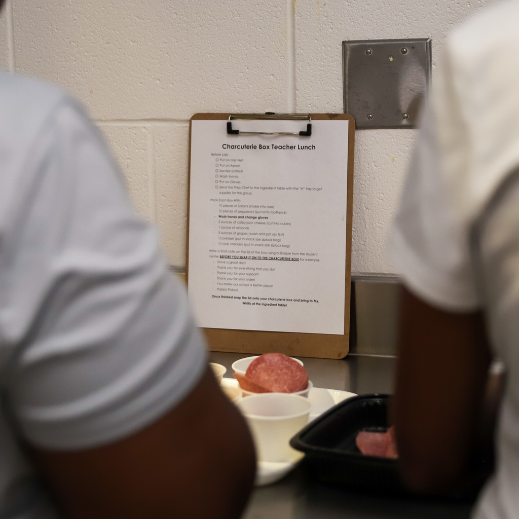 Students preparing teacher lunches