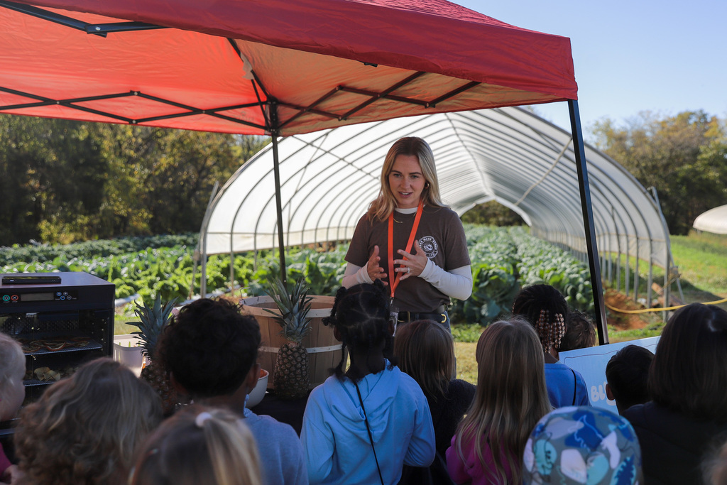 Need More Acres Volunteer speaks to students