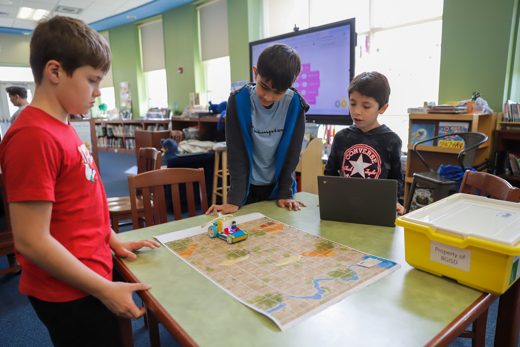 Working together to code a LEGO Jeep
