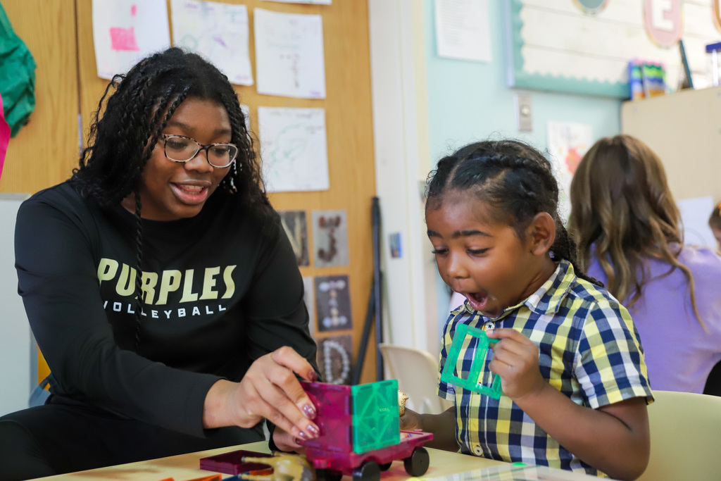 Building cars with magnet tiles