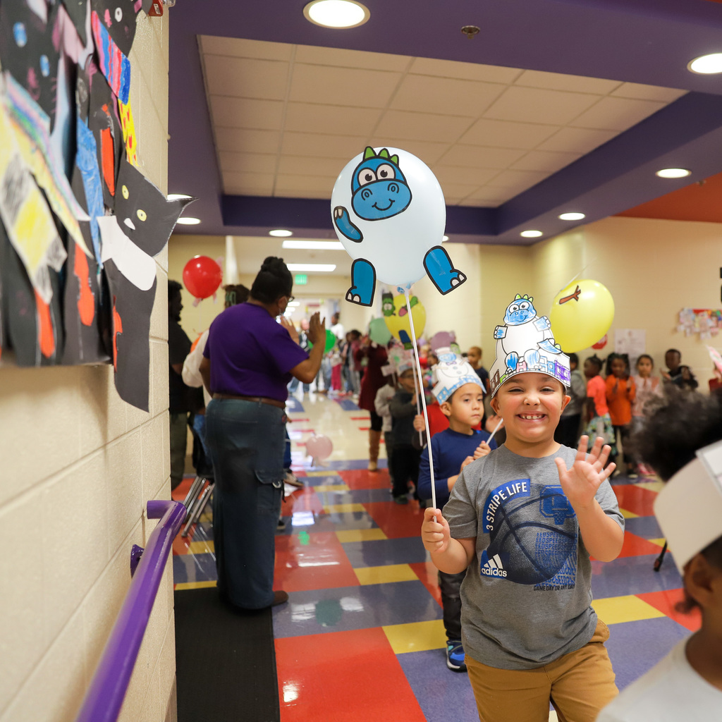 Balloon parade, blue dinosaur balloon