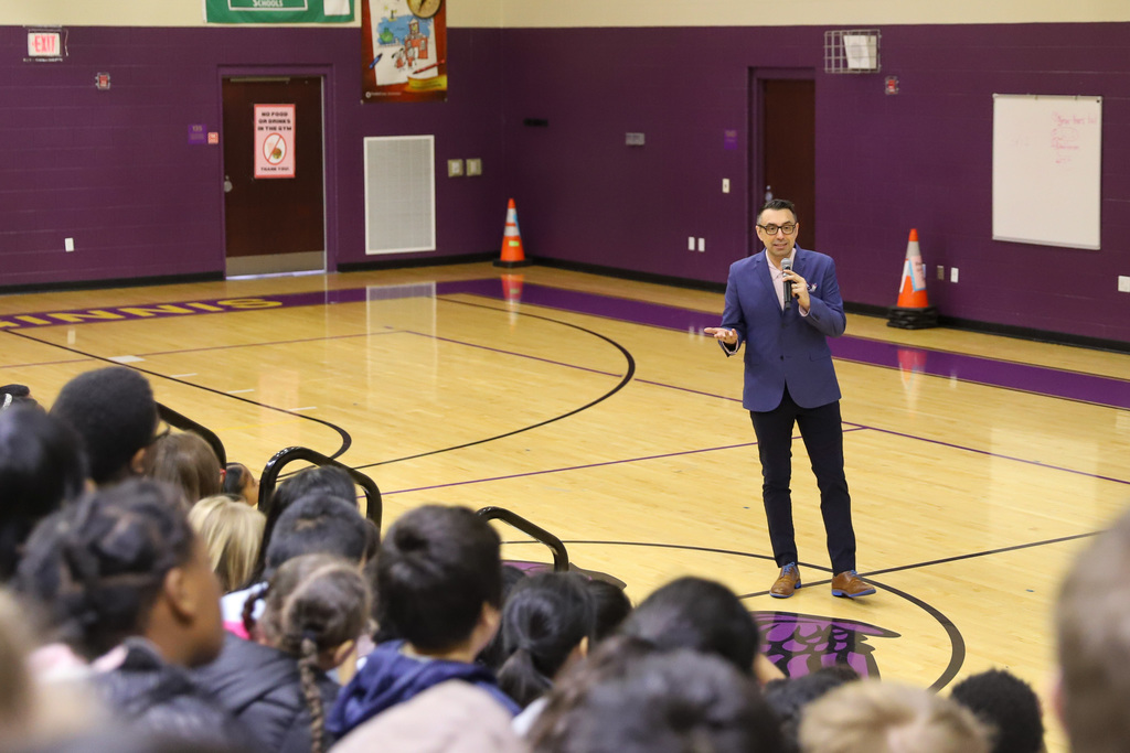 Jarrett J. Krosoczka speaking at Dishman McGinnis