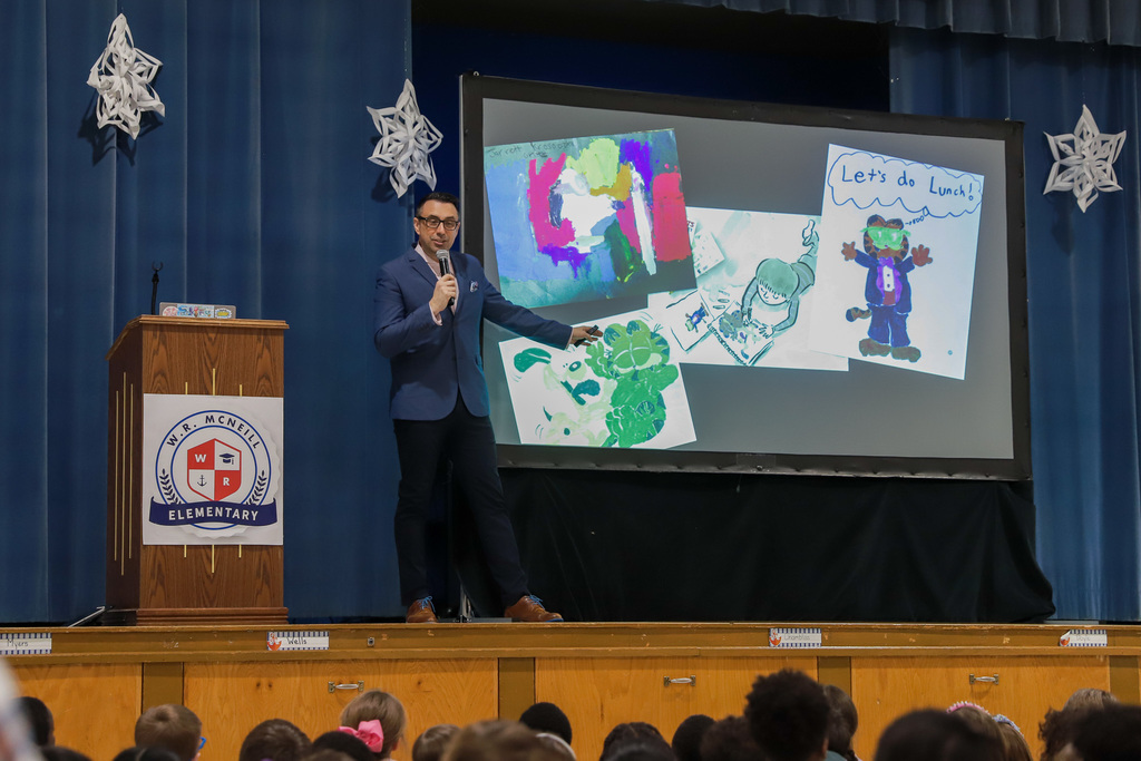 Jarrett J. Krosoczka speaking at McNeill Elementary