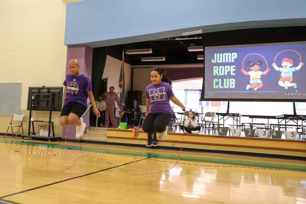 T. C. Cherry Jump Rope Club: Two students jumping