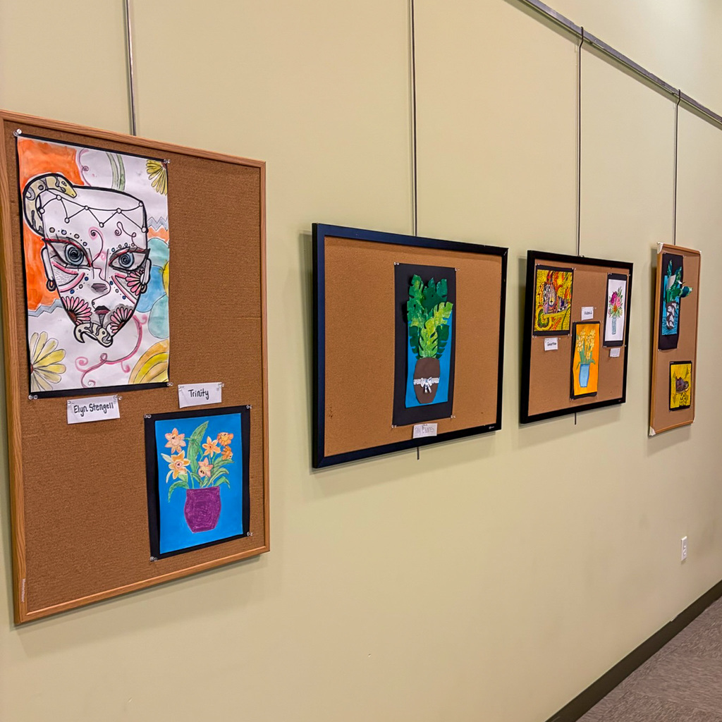 "Made in the Middle: Art Display, eight pieces on wall