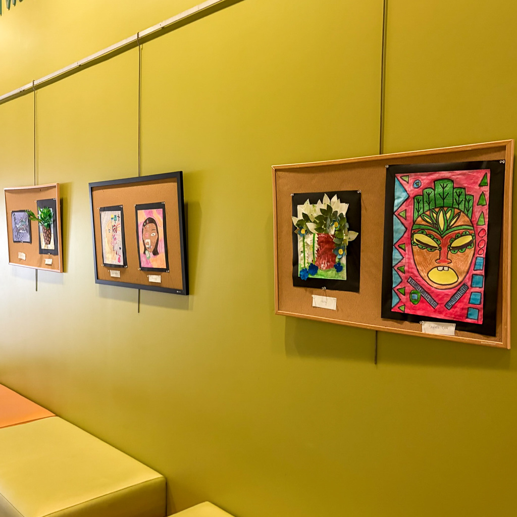 "Made in the Middle: Art Display, six pieces on wall