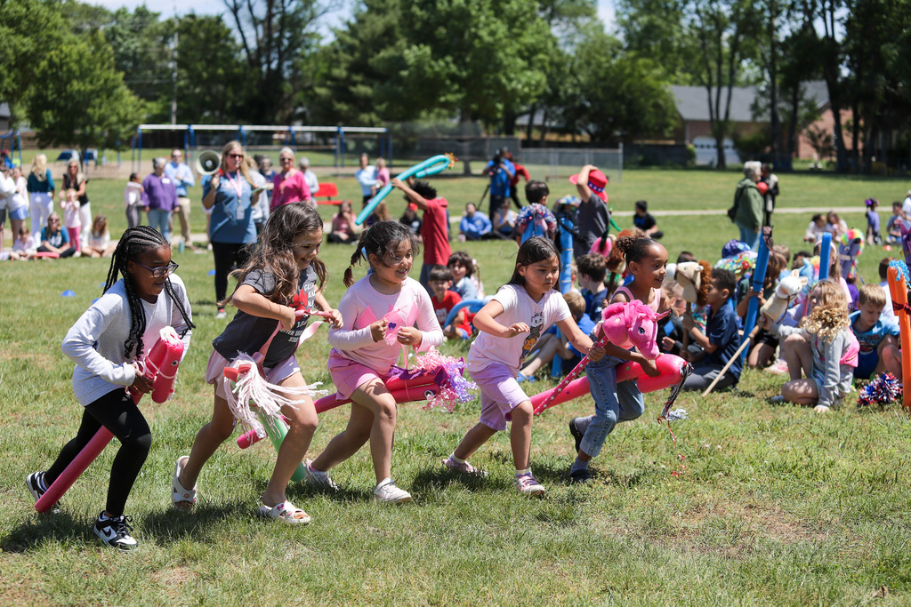 And they're off! First grade stick horse race