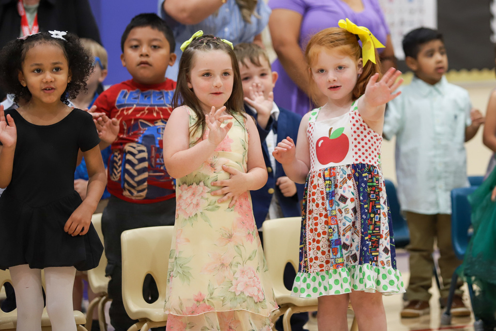 Preschool students singing at PreK Promotion