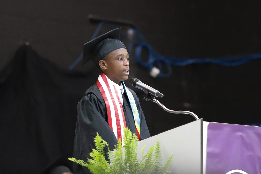 Student speaking at Moving Up Ceremony